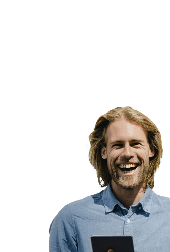 Smiling man holding a tablet.